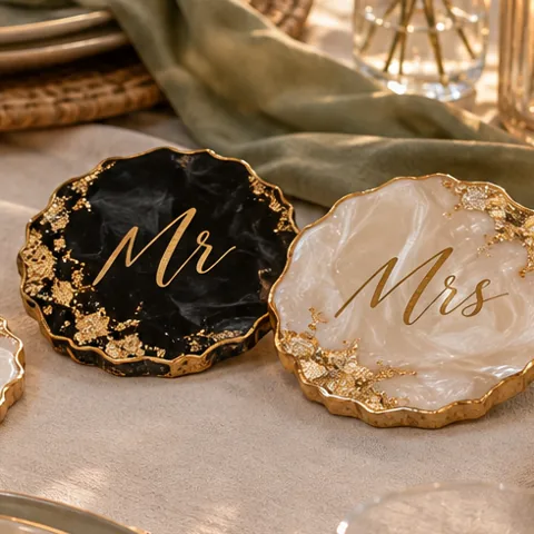 Mr and Mrs wedding coasters in black and pearl with gold script